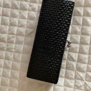 Black woven faux leather clutch
